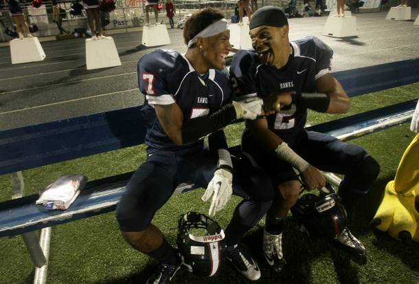 Teammates K.J. Young (left) and Trevor Hodge share a laugh during the CIF-Southern Section Eastern Division championship game victory over Phelan Serrano on Nov. 30, 2012.