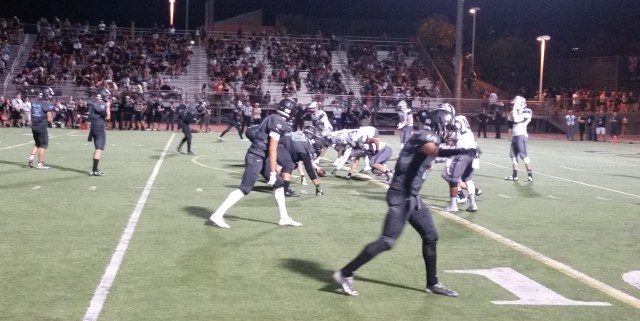 Corona Santiago (dark uniforms) scored 28 points in the third quarter vs. Temecula Chaparral in Week 4. 
