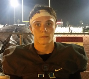 Santiago senior Jacob Hennie tossed his first 300-yard game in a Week 4 win vs. Chaparral. / Photo by DENNIS POPE