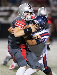 Rancho Verde senior QB E.J. Stewart (left) must be better protected this season for the Mustangs to win a CIF division title.